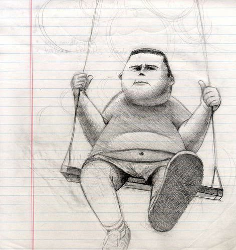 Chubby kid on a swing