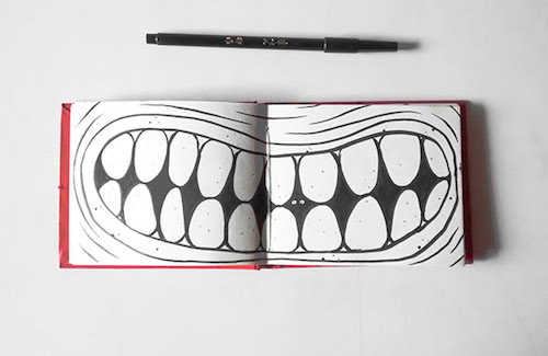 Drawing of a mouth smiling with teeth.