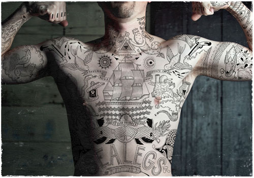 Man covered in doodle tattoos