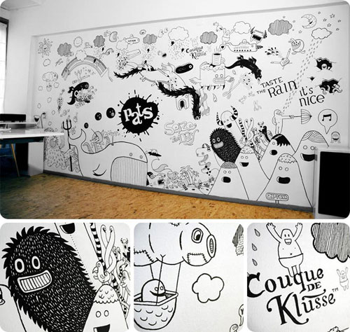 Doodles on a long white wall