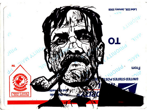 Drawing of a man on US Postal Service sticker.