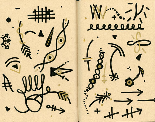 A sketchbook spread of various abstract doodles
