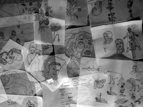 Photograph of numerous sketches on translucent paper