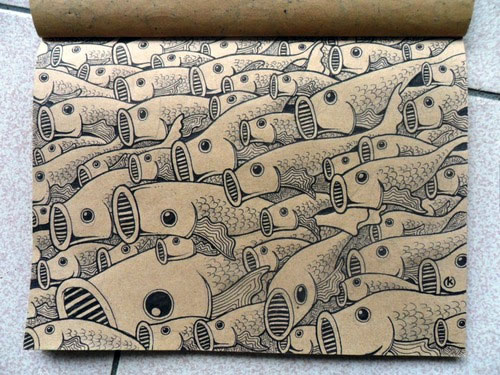 Sketchbook page showcasing a repeating pattern of fish drawings, spanning edge to edge
