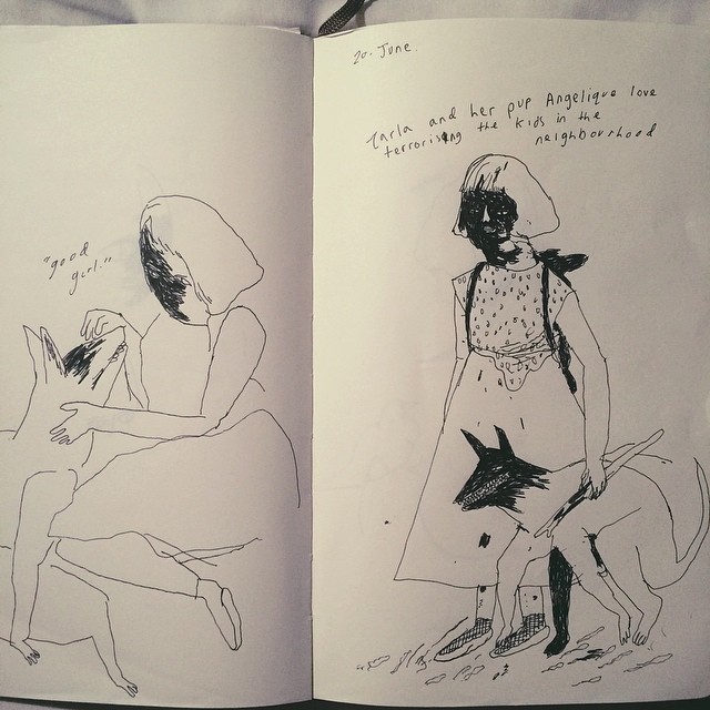 Sketchbook with sketches of a girl and animal.