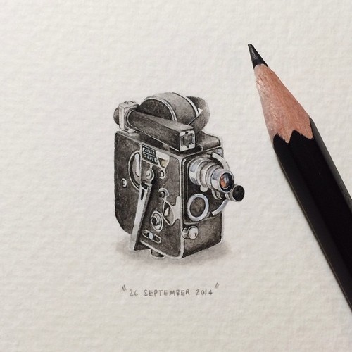 A pencil and painting of a camera.