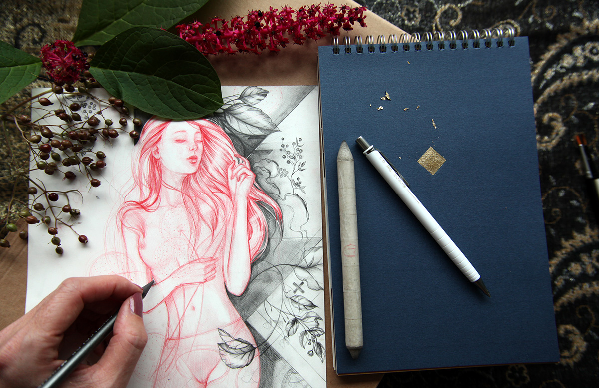 Materials and sketch of a woman.