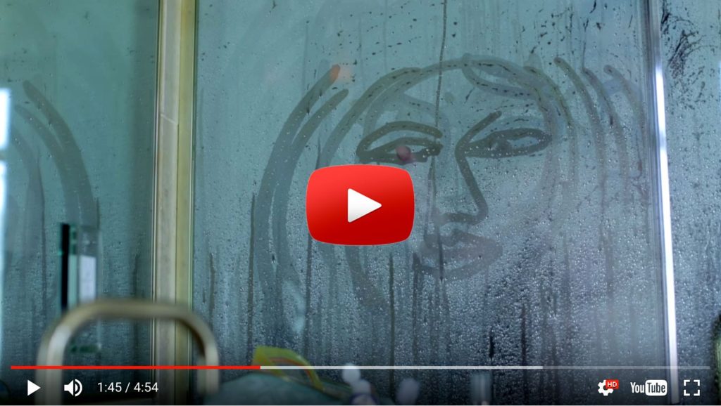 Video of doodle on steamed shower glass.