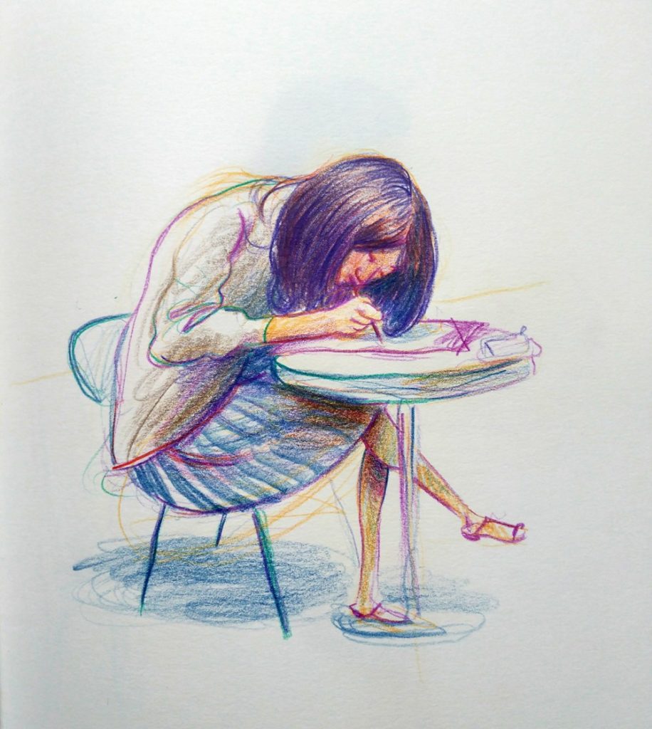 Sketch of girl writing and a table.