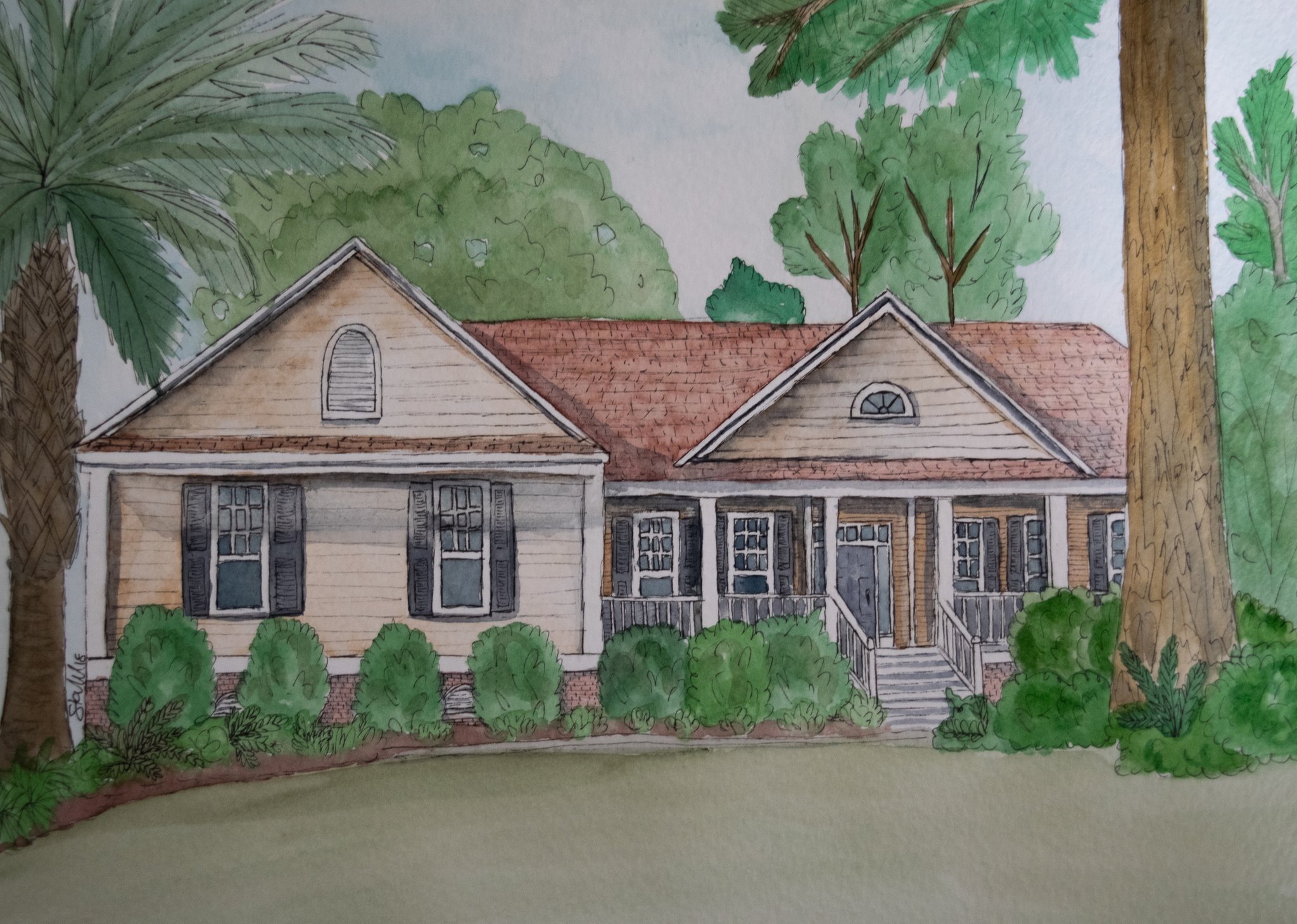 A watercolor drawing of a ranch-style home